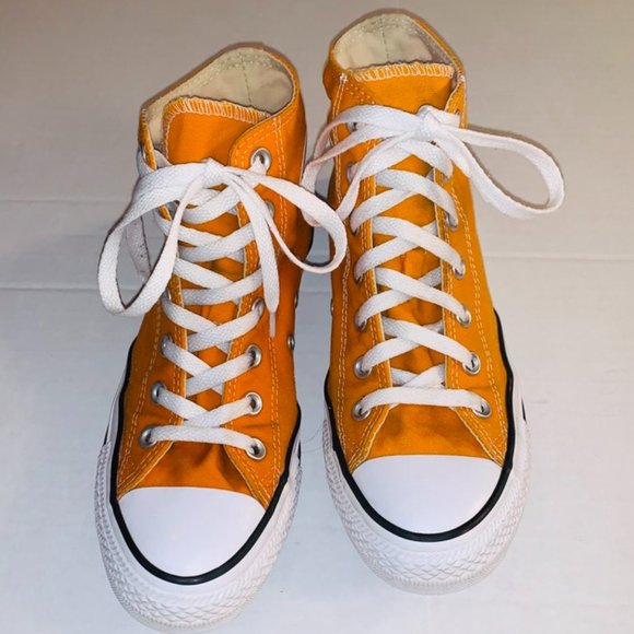 yellow high top tennis shoes